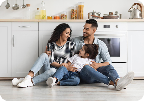 Family sitting in kitchen